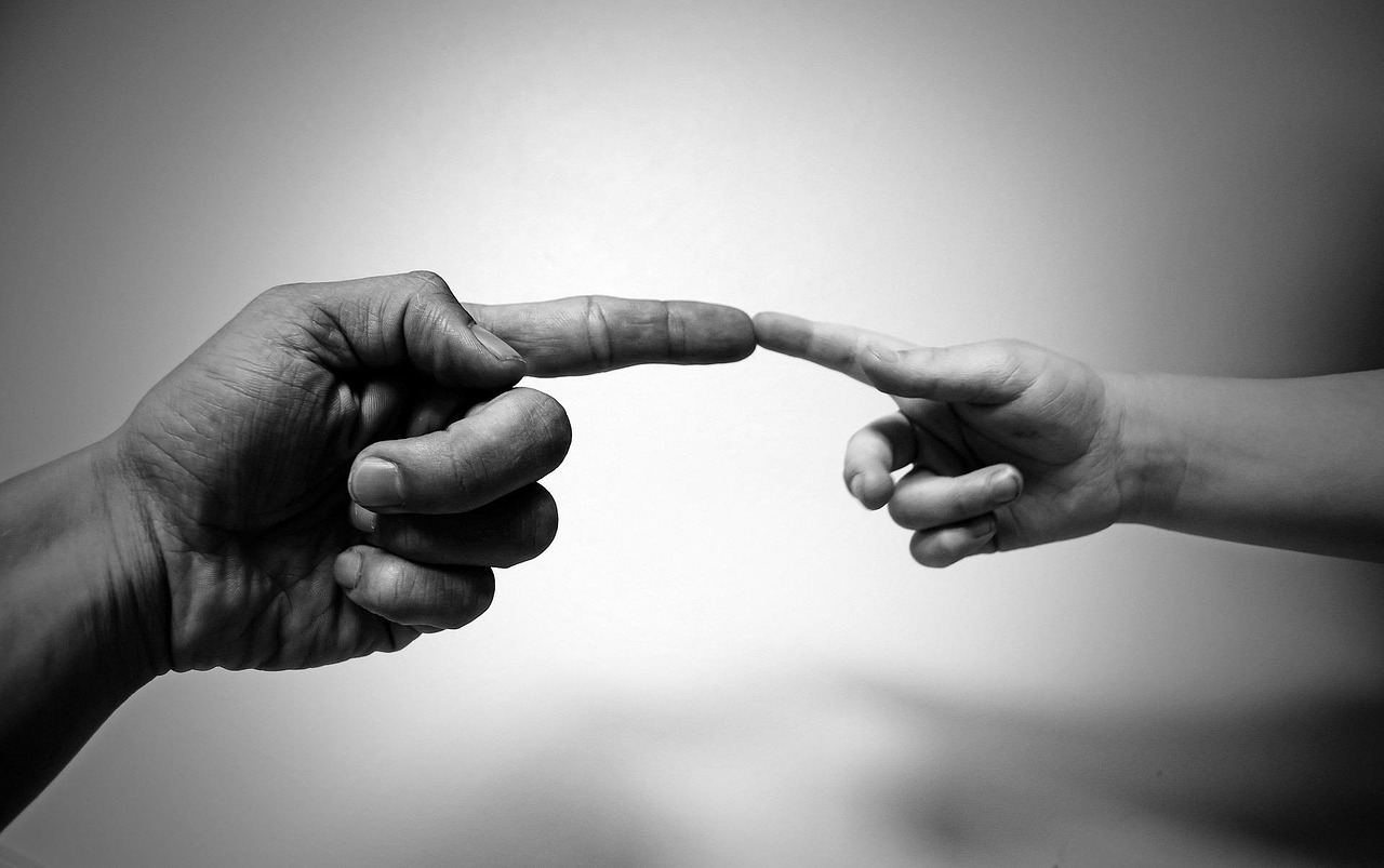 A person holding a white object in their hands